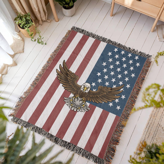 Patriotic woven blanket featuring bold American-themed design, draped over a rugged setting. Perfect for truckers, bikers, and hardworking patriots who value comfort with a statement.