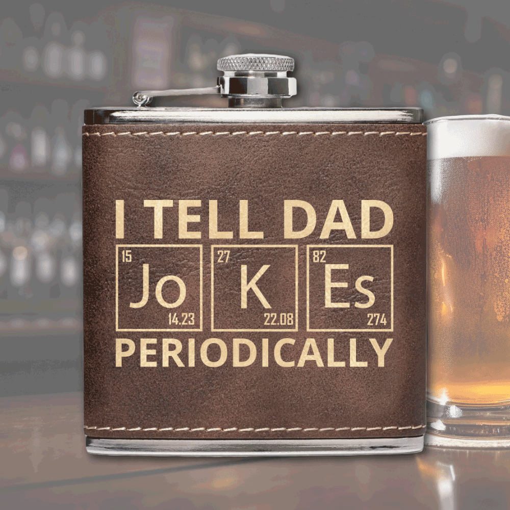 A fun and stylish stainless steel flask wrapped in a black leatherette cover, featuring the “I Tell Dad Jokes—Periodically” design with a periodic table theme. Perfect for dads who love a good pun.