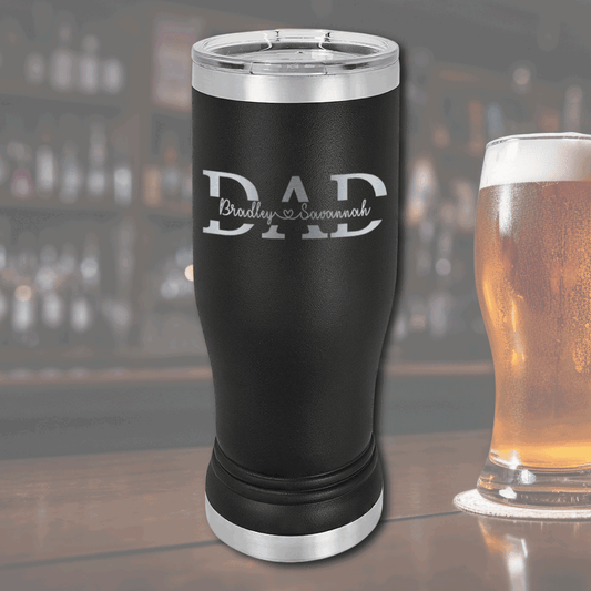 A double-wall vacuum-insulated black tumbler with a sleek, tapered design, keeping drinks hot or cold longer. Engraved leatherette wrap adds style and grip.