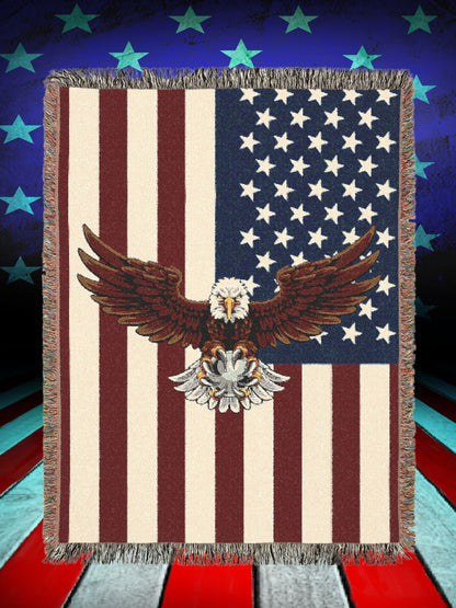 Woven blanket featuring a powerful bald eagle soaring over the American flag, a tribute to strength and patriotism.