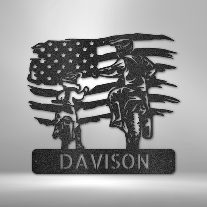 Custom steel sign featuring a dirt biker helping a young rider, set against a waving American flag, with a customizable nameplate.