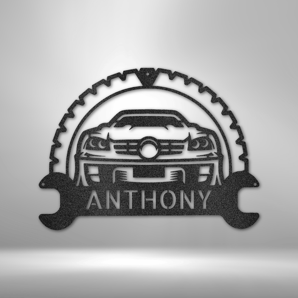 Custom steel garage sign featuring a sports car design with a wrench and gear frame, personalized with a name—perfect for mechanics and car lovers.