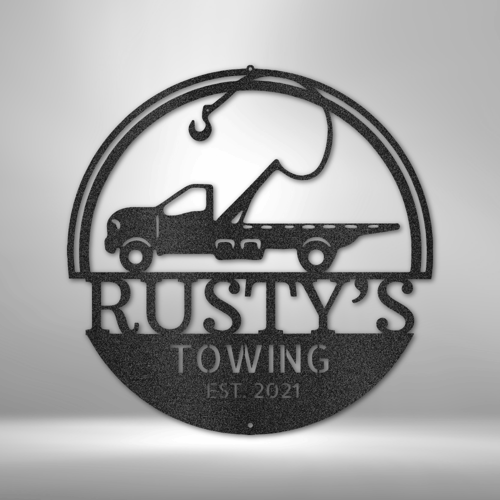 Custom towing company steel sign featuring a flatbed tow truck silhouette. Made from 16-gauge steel, powder-coated for durability, and available in Black, Silver, White, Copper, and Bronze finishes.