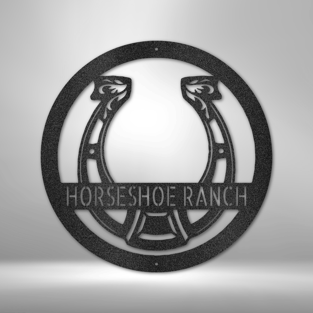 Custom metal ranch sign featuring a horseshoe design with intricate horse head details and the text "Horseshoe Ranch." Available in Black, Copper, Bronze, Silver, and White.