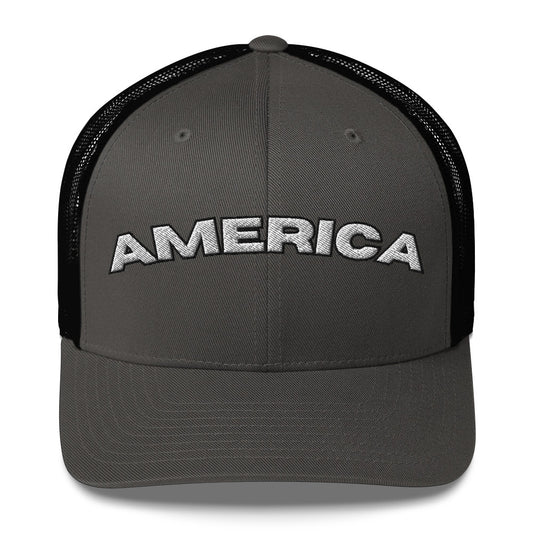 AMERICA arched trucker hat with white embroidered lettering on a classic snapback cap.